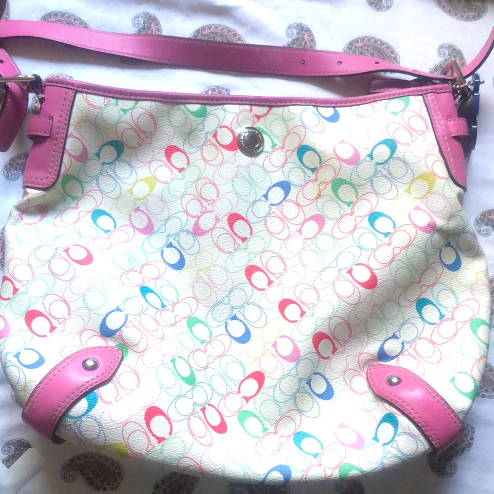 Coach’s crossbody bag in white/pink for sale